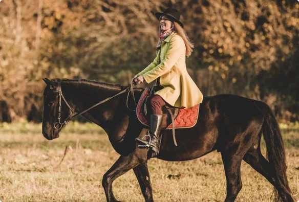 Woman riding a horse
